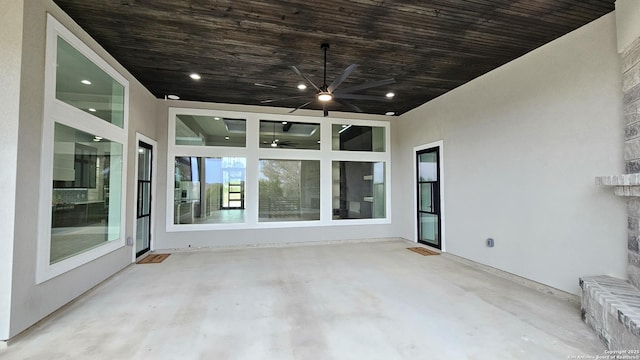 view of patio featuring a ceiling fan