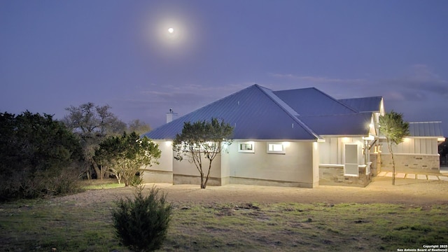 1501 Tramonto, New Braunfels, TX 78132 - rear view of house featuring a chimney and metal roof