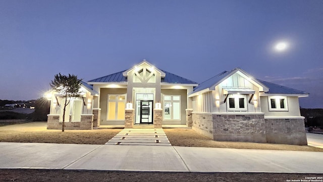 1501 Tramonto, New Braunfels, TX 78132 - exterior space featuring stone siding and metal roof