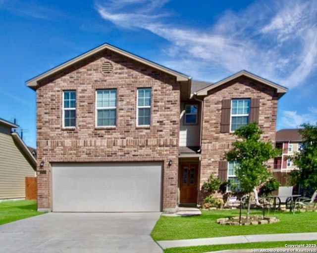 view of front of house featuring driveway, brick siding, a garage, and a front yard