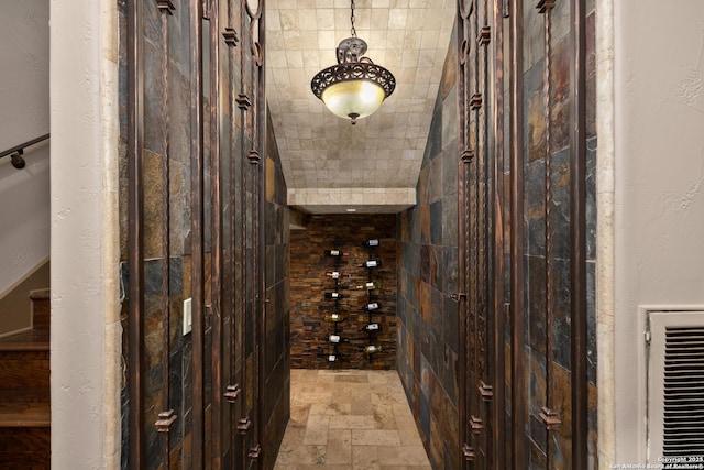 wine room featuring stone tile floors