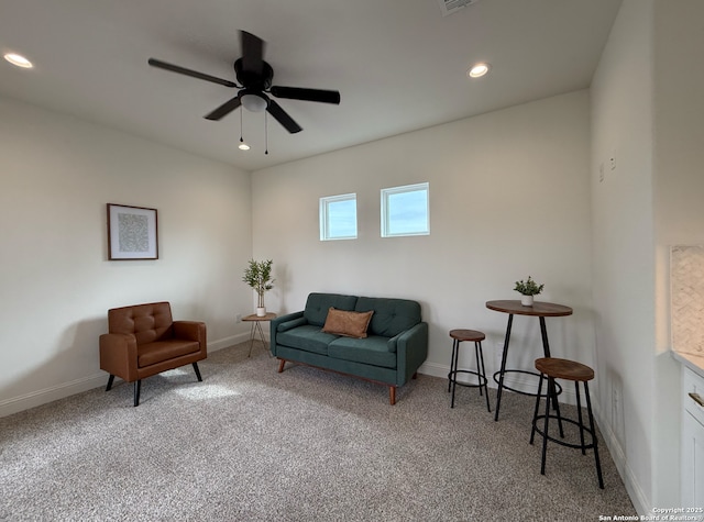 living area featuring recessed lighting, carpet flooring, visible vents, a ceiling fan, and baseboards