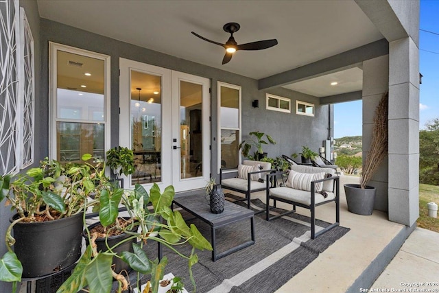 view of patio / terrace featuring a ceiling fan and visible vents