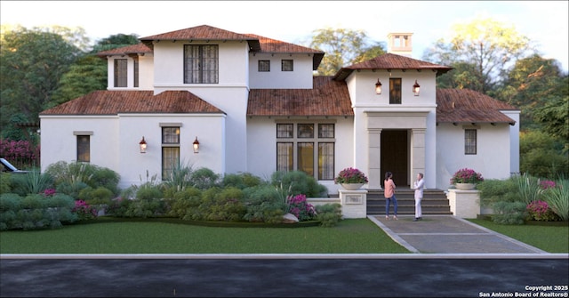 mediterranean / spanish-style home featuring stucco siding