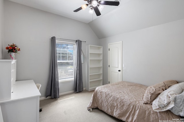 bedroom featuring lofted ceiling, ceiling fan, light carpet, and baseboards