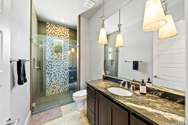 full bath featuring visible vents, a shower stall, toilet, and vanity