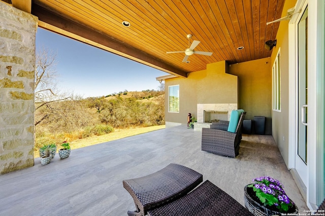 view of patio with ceiling fan