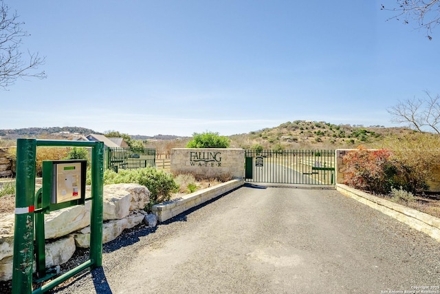 exterior space with a gate