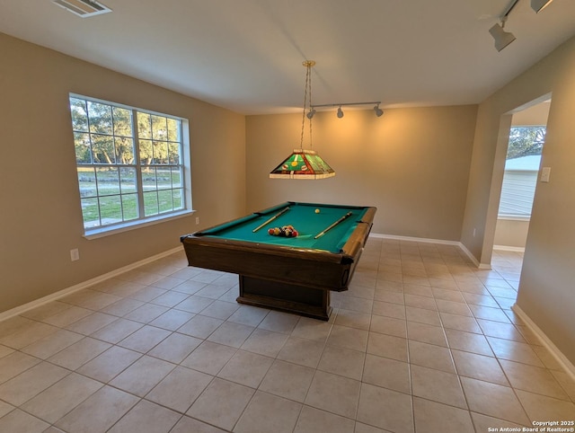 recreation room with visible vents, plenty of natural light, baseboards, and light tile patterned floors