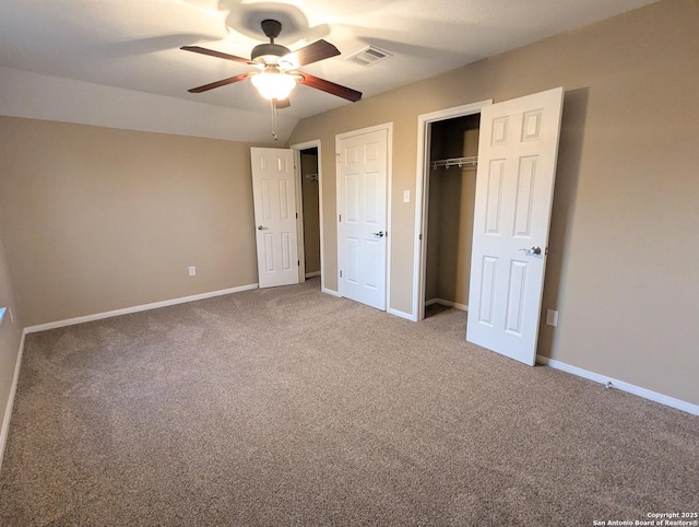 unfurnished bedroom with visible vents, a closet, baseboards, and carpet flooring