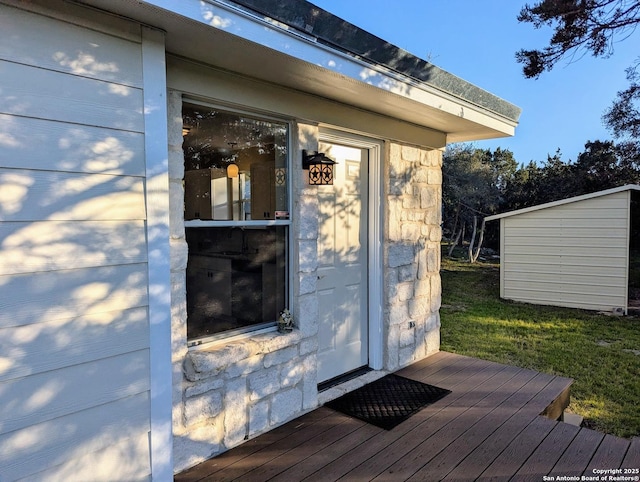 view of exterior entry with stone siding