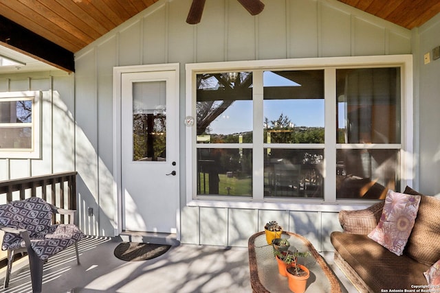 doorway to property featuring board and batten siding