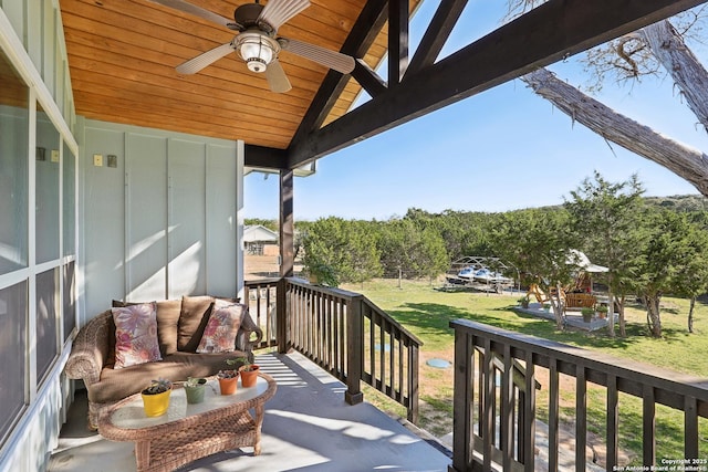 balcony featuring a ceiling fan