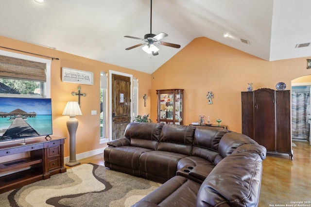 living room featuring arched walkways, visible vents, lofted ceiling, and ceiling fan