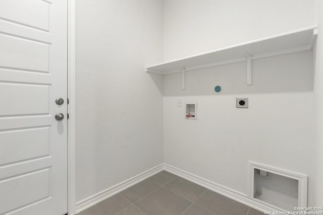 449 Horizon Pl, Seguin, TX 78155 - clothes washing area featuring electric dryer hookup, hookup for a washing machine, baseboards, dark tile patterned floors, and gas dryer hookup