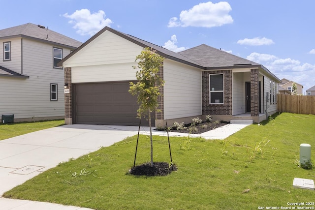 449 Horizon Pl, Seguin, TX 78155 - view of front of property featuring an attached garage, concrete driveway, and brick siding