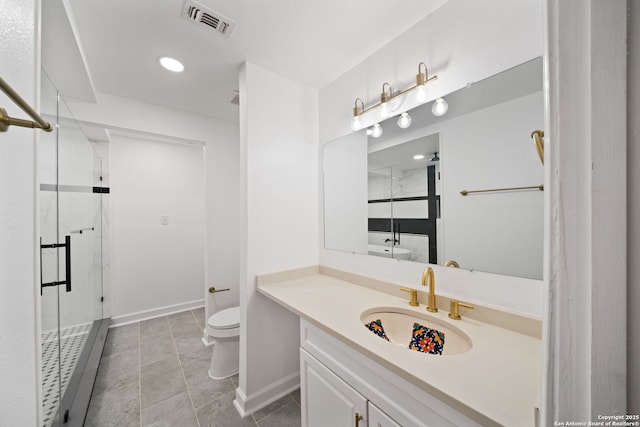 full bathroom featuring toilet, visible vents, vanity, baseboards, and a shower stall