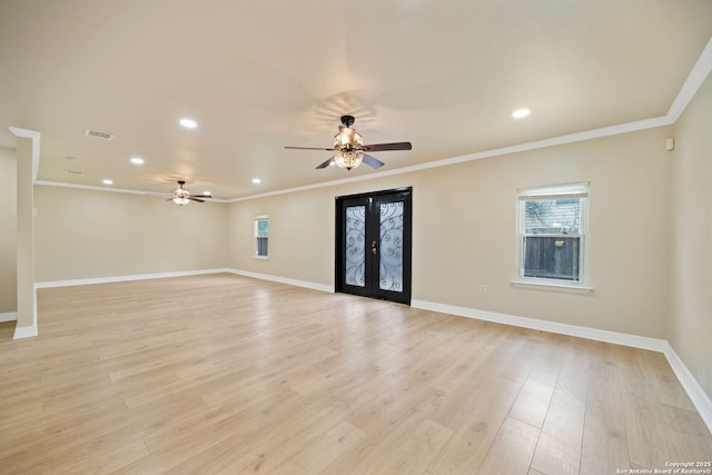 unfurnished living room featuring baseboards, visible vents, crown molding, french doors, and light wood-type flooring