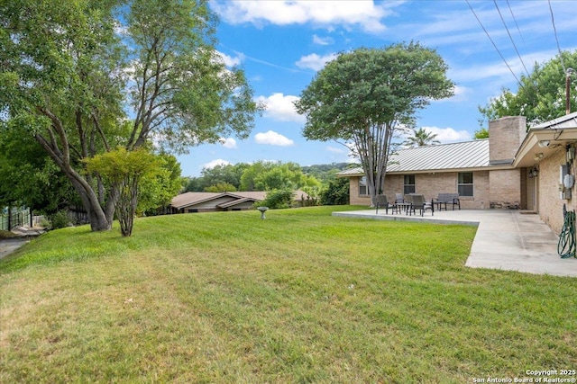 6822 Moss Oak, San Antonio, TX 78229 - view of green lawn featuring a patio