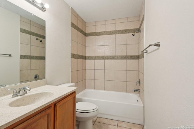 full bathroom with vanity, bathtub / shower combination, tile patterned flooring, and toilet