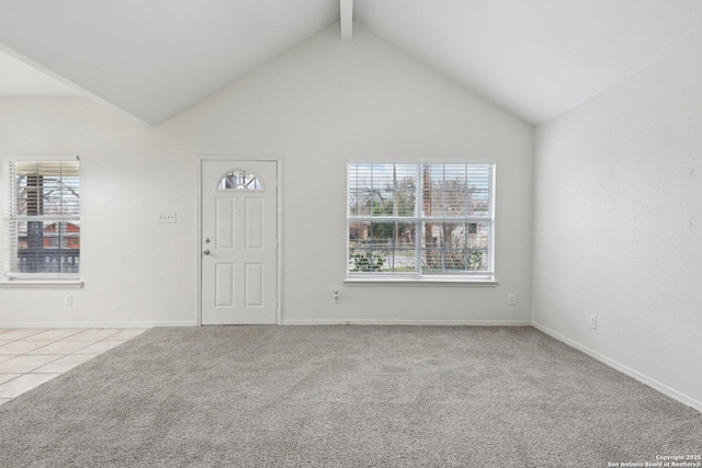 interior space featuring high vaulted ceiling, carpet flooring, beam ceiling, and baseboards