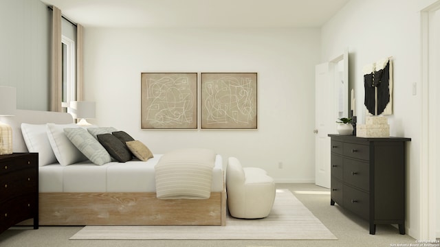 bedroom with baseboards and light colored carpet