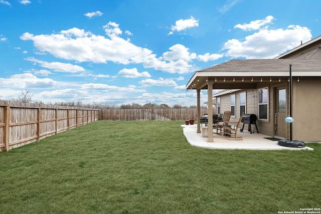 view of yard featuring a fenced backyard and a patio