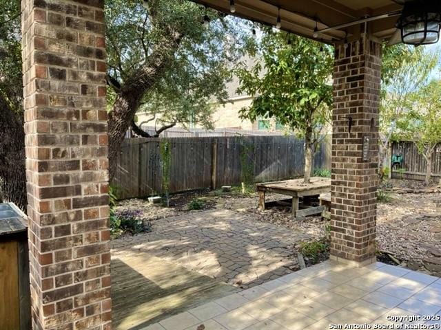 view of patio featuring a fenced backyard