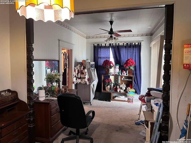 office area with carpet floors and a ceiling fan