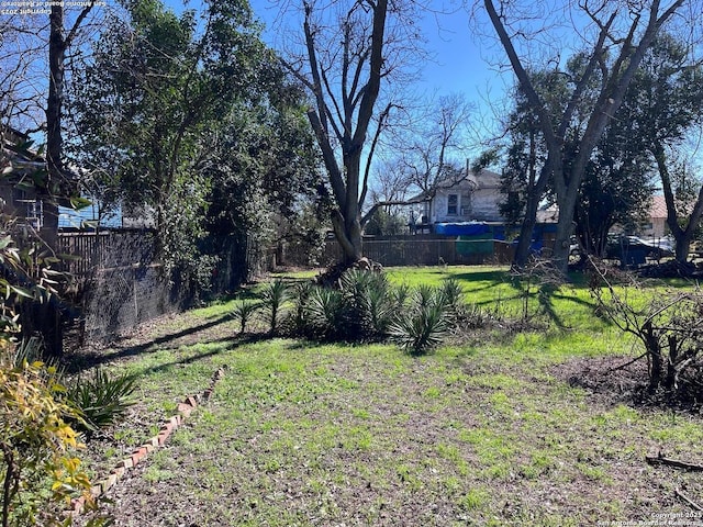 view of yard featuring fence