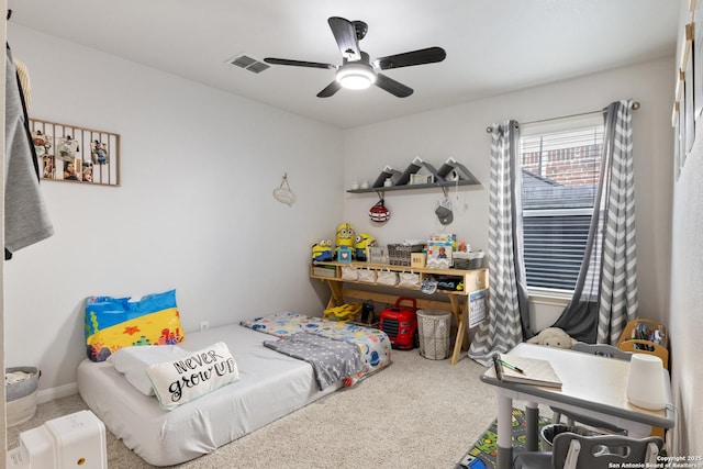 bedroom with ceiling fan, visible vents, and carpet flooring