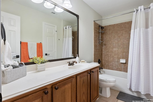 full bath featuring shower / bath combo, visible vents, toilet, tile patterned floors, and vanity