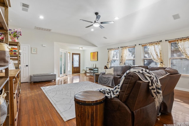 living room with recessed lighting, visible vents, ceiling fan, vaulted ceiling, and wood finished floors