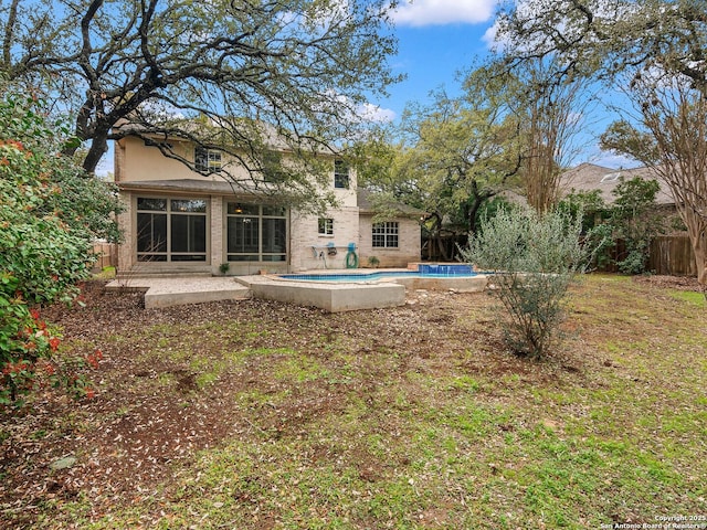 exterior space featuring fence, an outdoor pool, and a patio