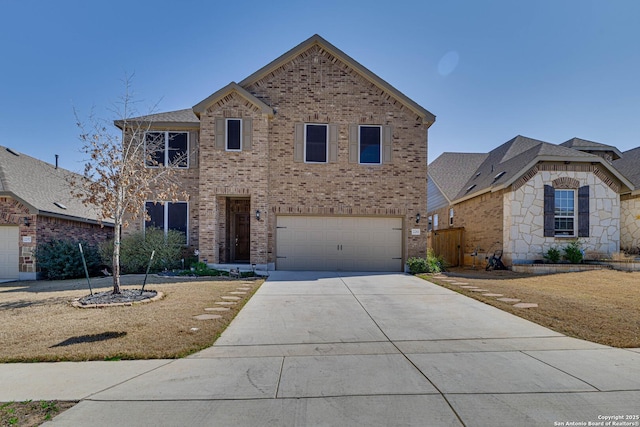 view of front facade with driveway, an attached garage, and brick siding