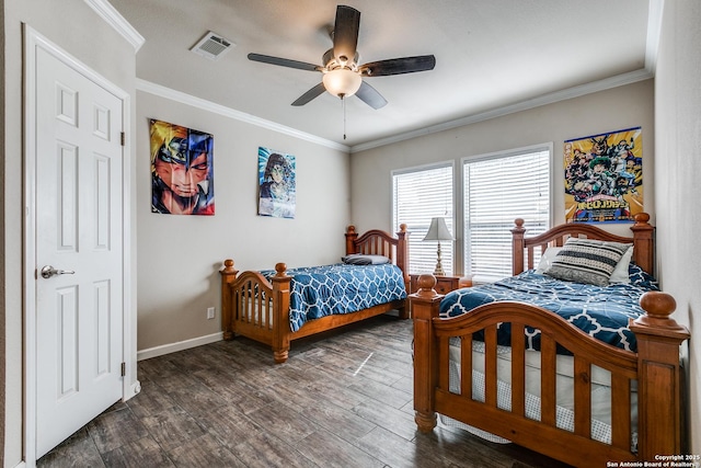 bedroom featuring baseboards, visible vents, dark wood finished floors, and ornamental molding