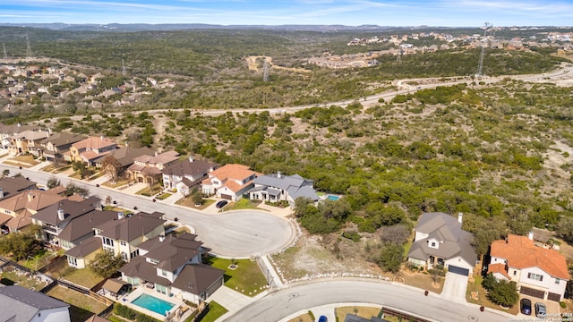 birds eye view of property with a residential view