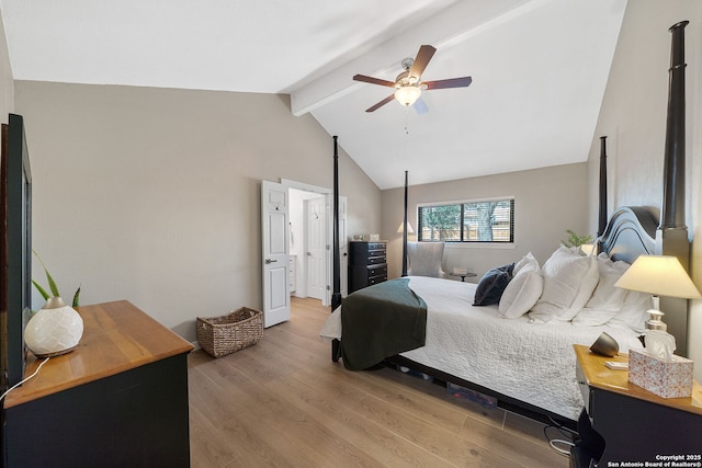 bedroom featuring a ceiling fan, vaulted ceiling with beams, and light wood-style flooring