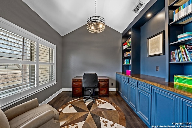 office space with lofted ceiling, dark wood-style floors, visible vents, and baseboards