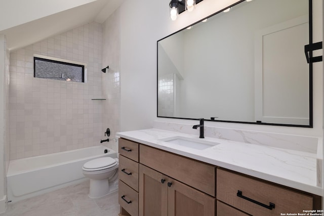 full bathroom with lofted ceiling, shower / tub combination, vanity, and toilet