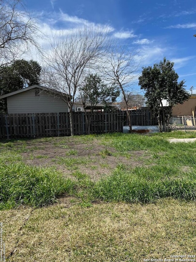 view of yard with fence