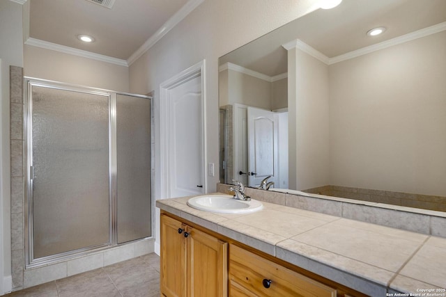 full bathroom with recessed lighting, vanity, tile patterned floors, a stall shower, and crown molding