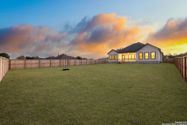 view of yard featuring a fenced backyard