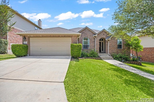 25723 Preserve Crst, San Antonio, TX 78261 - view of front facade featuring an attached garage, a front lawn, driveway, and brick siding