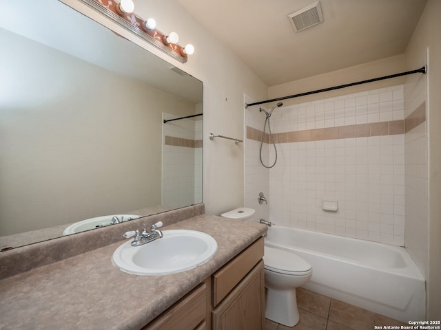 full bath with shower / bath combination, visible vents, toilet, vanity, and tile patterned floors