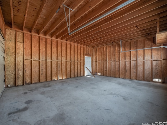 miscellaneous room with unfinished concrete flooring