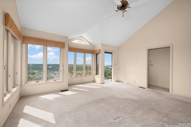 unfurnished sunroom with lofted ceiling and ceiling fan