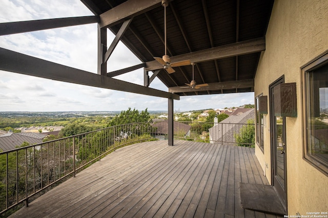 wooden deck featuring ceiling fan