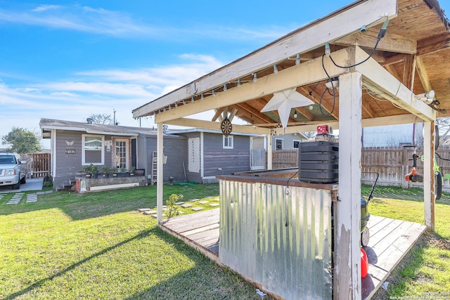 view of yard with fence and a gazebo