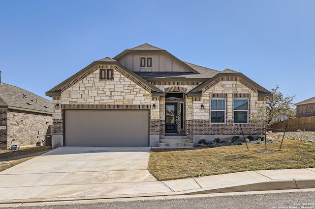 view of front facade featuring a garage, brick siding, fence, concrete driveway, and board and batten siding